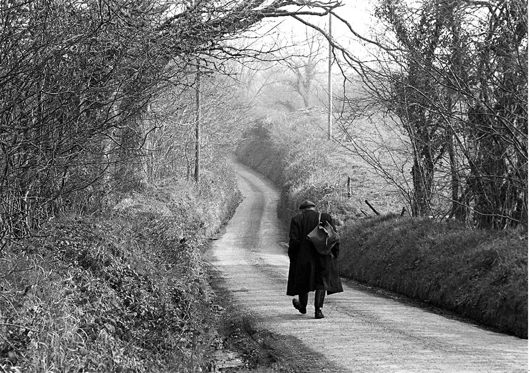 Ivor Brock walking up West Lane, Addisford, Dolton, 1974