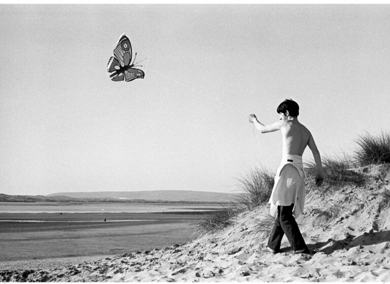 Boy flying a kite, Instow, 1974